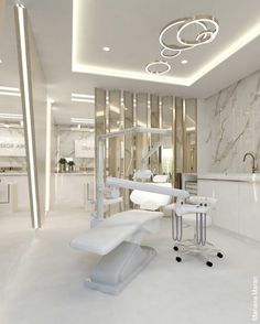 a dental office with marble walls and white furniture