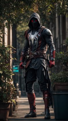 a man dressed as spider - man standing on the street in front of some plants