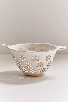 a white bowl sitting on top of a table