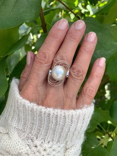 Natural white mabe pearl ring with round swirls on both sides. Sterling Silver 925 . Unique design. Pearl diameter 1.3cm White Pearl Ring, Mabe Pearl, June Birthstone, June Birth Stone, Pearl Ring, White Pearl, Rings Statement, Pearl White, Silver 925