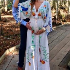 5favorite Gorgeous Embroidered Maternity Gown. Ships In 14-16 Days. Words Can’t Describe How Beautiful This Piece Is. Similar To Fillyboo “Strange Magic” Gown. This Is Oversized And Designed To Fit Allthis Is One Size, Sizes Are Listed As Reference. Bust-130cm Sleeve-40cm Length-135cm Embroidered V-neck Maxi Dress For Wedding, V-neck Embroidered Maxi Dress For Wedding, White Embroidered Maxi Length Gown, White Embroidered Maxi Gown, Fitted Bohemian Maternity Dress In White, White Fitted Bohemian Maternity Dress, Fitted Bohemian White Maternity Dress, White Maxi Length Gown With Floral Embroidery, White Maxi Gown With Floral Embroidery