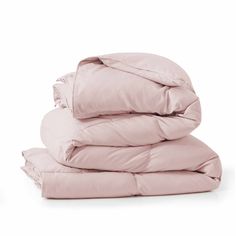 three pink sheets stacked on top of each other