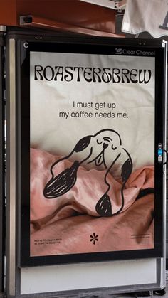 a sign advertising roasters brew on the side of a building