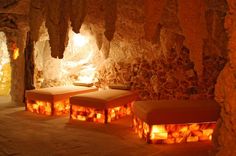 two benches made out of fire bricks in a cave