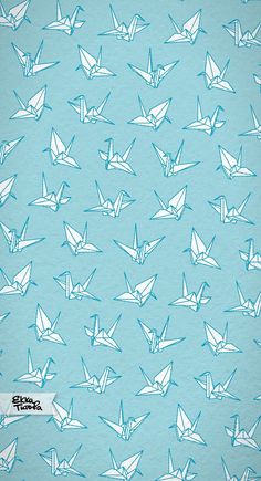 a blue background with white origami birds on it