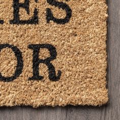 a door mat with the words help us or on it