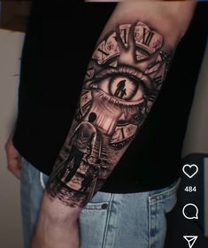 a man's arm with an all seeing eye and clock on the inside of it