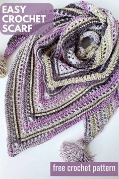 an easy crochet scarf with fringes and tassels on the edges