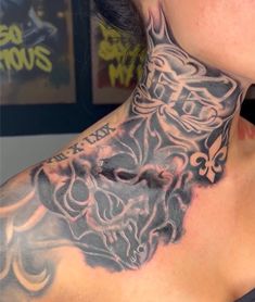 a woman with a tattoo on her neck