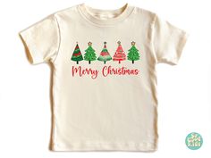 Welcome to SoGoodKids 🎄 🎄 Shop our festive Christmas shirts! Perfect for holiday parties, family matching, and spreading cheer.  Merry Christmas and happy shopping! 🌟 Materials: White, Natural & Pink: 100% cotton H. Gray: 90/10% cotton/polyester Production time: 1-3 business days Shipping time: 2-6 days Delivery time: Usually within 3-9 days depending on your location and selected shipping service. Care Instruction: Inside out, wash with delicate cycle. Lay flat to dry Do not bleach Do not iron directly onto the design Do not dry clean SoGoodKids to see more from our shop, please visit https://www.etsy.com/shop/SoGoodKids Happy Christmas Day, Christmas Toddler, Holiday Kids, Family Matching Christmas, Christmas Tree Shirt, Merry Christmas Shirts, Tree Shirt, Toddler Christmas, Christmas Happy