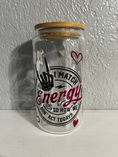 a glass jar with the words i love math energy on it