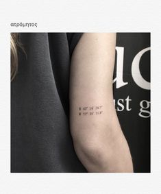 a woman with a tattoo on her arm that reads, you are not in the right place