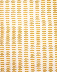 a white and yellow wallpaper with gold circles