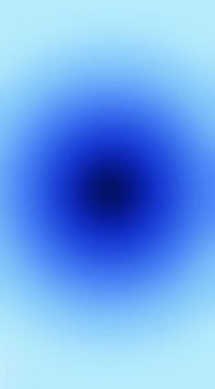 an abstract blue and white background with a circular shape in the center, that is slightly blurry