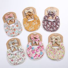 These gorgeously handmade boho bibs with hanging pompom tassels are reversible, so you really get two bibs in one! They also come with adorable matching nylon hair bow headbands that will compliment any reborn outfit you have your baby girl in! Imported with care from Singapore. Please allow 1 to 7 business days for processing. Shipping times may vary, with an estimated delivery of up to 27 business days to Canada and up to 19 business days to the United States. I will email you the tracking num Handmade Bib, Girls Bib, Baby Bow Headband, Burp Cloth Set, Bib Set, Creation Couture, Bow Set, Boho Baby, Floral Baby