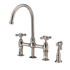 a faucet with two handles and nozzles