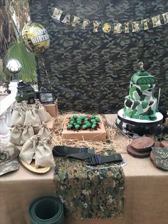 an army themed birthday party with cake and decorations