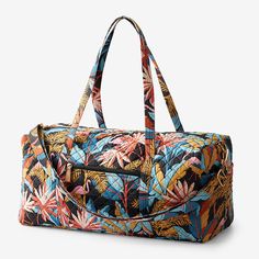 {"For quick weekend jaunts or adventures farther afield, hit the road (or friendly skies) with our chic, quilted duffel bag. Nice and roomy, it comes in fun original prints and is outfitted with an adjustable shoulder strap, two handles, inner and outer pockets, and leather trim; zip top. Complete the look with our matching tote and cosmetics bags, sold separately. Quilted duffel bag 100% cotton, with foam fill Great for travel, the roomy bag is patterned in your choice of exclusive prints Featu Duffle Bag Pattern, Quilted Duffle Bag, Cosmetic Bag Set, The Company Store, Pack Up, Family Event, Blue Ivory, Brushed Cotton, Bag Set