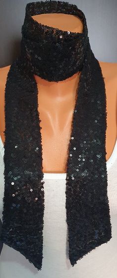 GIFT FOR HER,GIFT FOR EVERYONE SPECİAL. Add a little dazzle to every look with this sequin_spangled scarf cut long and skinny to flutter dramatically with every move. "Elevate your style with our sequin skinny scarf, adding a touch of glamour to any outfit. Crafted with attention to detail, this shimmering accessory is perfect for special occasions or to effortlessly elevate your everyday look. Versatile and chic, it's a must-have addition to your accessory collection." Black Skinny sequin scarf Narrow Scarf, Sequin Accessories, Tie Scarves, Sparkly Scarf, Sequin Scarf, Sequin Outfit, Scarf Tying, Black Skinnies, Black Sequins