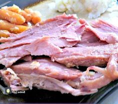 ham, mashed potatoes and carrots on a plate