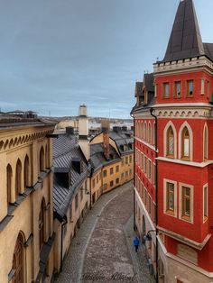 an aerial view of buildings and cobblestone streets