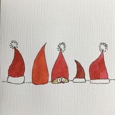 an image of santa hats on white paper