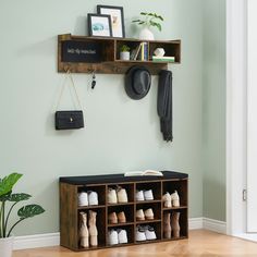 a wall mounted shelf with shoes on it