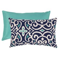 two pillows with blue and white designs on them