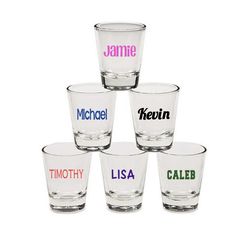 six shot glasses with different names on them