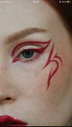 Aespacore Makeup, Fire Inspired Makeup Look, Red Face Paint Ideas, Asymmetrical Eyeliner, Easy Graphic Eyeliner Hooded Eyes, Dragon Eyeliner, Fantasy Eyeliner