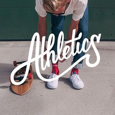 a man bending over with his skateboard in front of him and the words athletics written on it