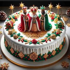 a cake decorated with christmas decorations and figurines