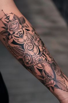 a person with a tattoo on their arm