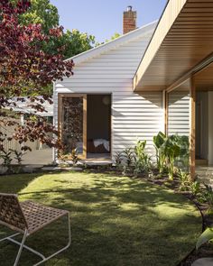 the back yard is clean and ready to be used as an outdoor space for relaxing