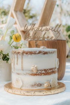 a white cake sitting on top of a table