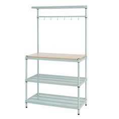 three tiered shelving unit with wooden top and hooks on the bottom shelf, light blue