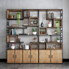 a book shelf filled with lots of books next to a wall covered in shelves and plants