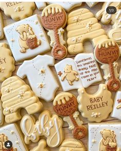 baby shower cookies are arranged on a table