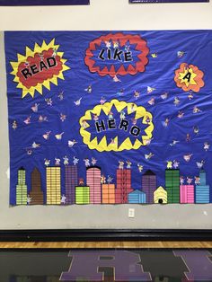 a bulletin board that says read like hero