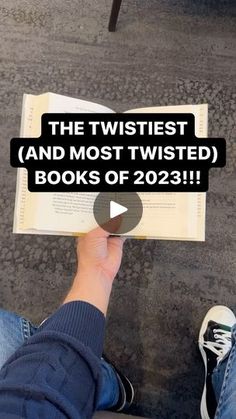 a person holding up a book with the words, the twistest and most twisted books of 2013