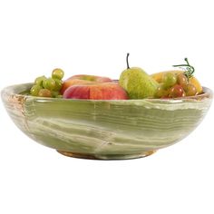 a bowl filled with lots of different types of fruit