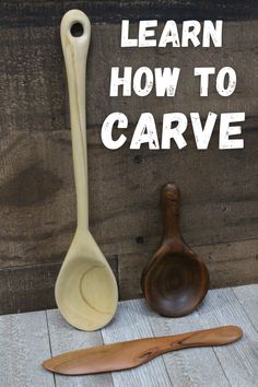 a wooden spoon and ladle sitting on top of a table next to a sign that says learn how to carve