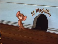 a cartoon mouse standing in front of a sign for el magnifiro's