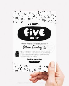 a hand holding up a white card with black lettering on it that says i got five on it