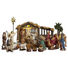 a nativity scene with figurines of people and animals