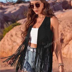 Black Fringe Suede Vest, Western Style, Never Worn Casual Black Beach Outerwear, Trendy Summer Outerwear With Fringe, Trendy Summer Fringe Outerwear, Casual Black Summer Outerwear, Trendy Black Summer Outerwear, Black Bohemian Summer Outerwear, Bohemian Black Summer Outerwear, Winter Bohemian Black Vest, Trendy Black Vest For Spring