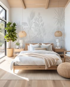 a bedroom with white walls and wooden floors