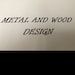 a sign that reads central and wood design on it's side, with the words central and wood written in black