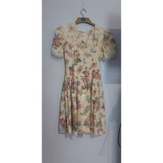 Beautiful floral midi dress with a lace collar  in immaculate condition, unsure on age, would fit a UK 4. Exact waist measurement is 24.5 inches. Length 29 inches coquette Boho vintage coquette fashion boho dress vintage dress coquette dress Vintage Short Sleeve Lace Dress With Lace Trim, Vintage Lace Dress With Lace Trim And Short Sleeves, A-line Vintage Dress With Lace Trim, Spring Vintage Lace Dress With Short Sleeves, Feminine Vintage Dress With Lace Trim And Short Sleeves, Fitted Cream Vintage Dress With Floral Print, Vintage Lace Dress With Short Sleeves For Spring, Feminine Vintage Midi Dress With Lace Trim, Fitted Knee-length Vintage Dress With Lace Trim