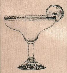 a drawing of a margarita glass with a lime on the rim